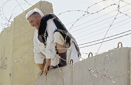 Image of "War Photographer at Front.": Swiss independent photographer covered since 1980 various war fronts as in Palestine, Turkey, Central America, and Pakistan. 
Die unabhängige Schweizer Fotografin fotografierte an verschiedenen Kriegsschauplätzen.