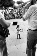 Image of sheet 19780110 photo 17: Herman Sherman spielt mit seiner Band auf einem Platz in N.O. kl. Mädchen macht mit Tambourin mit. 
Herman Edward Sherman, Sr. (June 28, 1923 - September 10, 1984), was an American jazz saxophonist and bandleader. √

Sherman was born in New Orleans. He played clarinet in high school and later picked up alto and tenor sax. He began working with brass bands on the New Orleans jazz scene around 1940, playing in the Eureka Brass Band, the Onward Brass Band, and the Young Tuxedo Brass Band. He took over the leadership of the Young Tuxedo Brass Band in 1971 until his death in 1984, and during his tenure the group toured the United States repeatedly and appeared in Berlin in 1980. He led the ensemble in the studio for their 1983 release Jazz Continues on 504 Records. Sherman occasionally played in dance bands, but concentrated on his work in brass bands. He died in his home city of New Orleans.