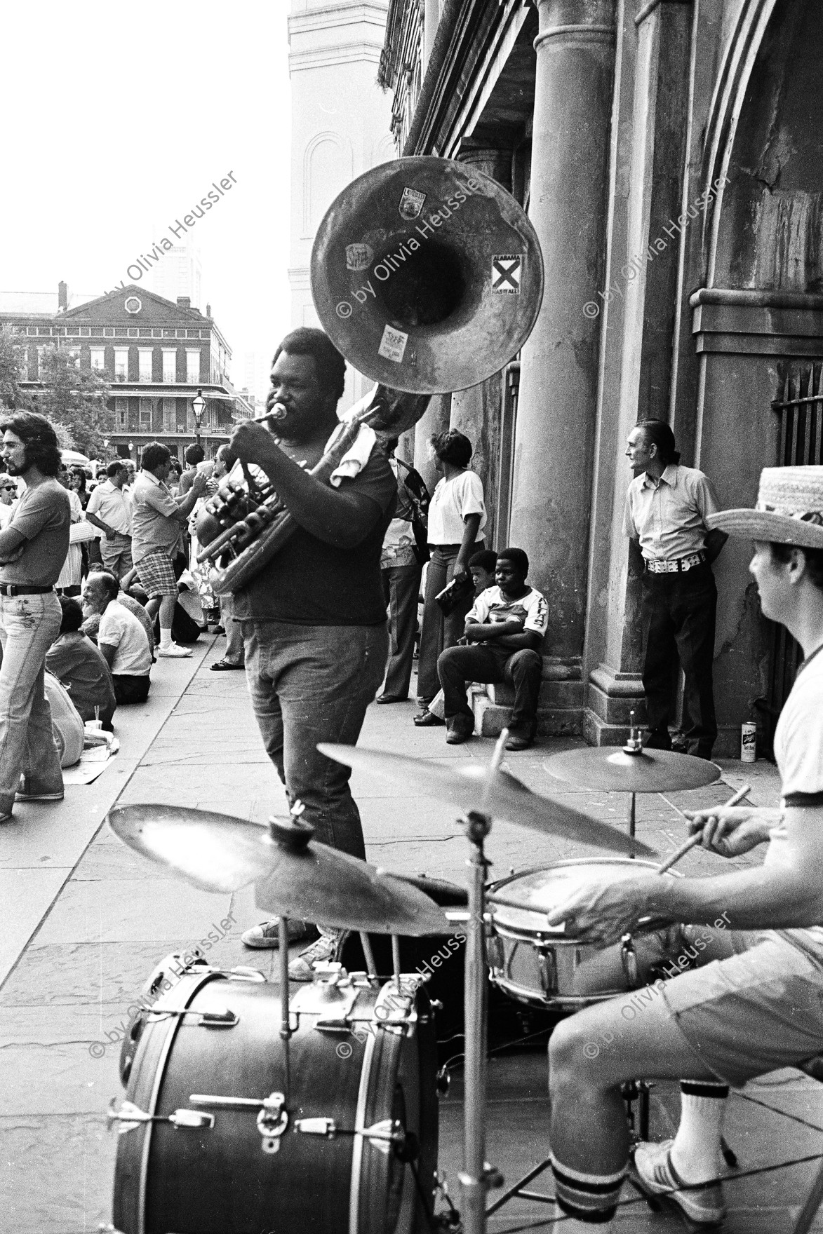 Image of sheet 19780110 photo 19: Tuba Player, Herman Sherman mit seiner Band auf einem Platz in N.O. 
Herman Edward Sherman, Sr. (June 28, 1923 - September 10, 1984), was an American jazz saxophonist and bandleader. √

Sherman was born in New Orleans. He played clarinet in high school and later picked up alto and tenor sax. He began working with brass bands on the New Orleans jazz scene around 1940, playing in the Eureka Brass Band, the Onward Brass Band, and the Young Tuxedo Brass Band. He took over the leadership of the Young Tuxedo Brass Band in 1971 until his death in 1984, and during his tenure the group toured the United States repeatedly and appeared in Berlin in 1980. He led the ensemble in the studio for their 1983 release Jazz Continues on 504 Records. Sherman occasionally played in dance bands, but concentrated on his work in brass bands. He died in his home city of New Orleans.