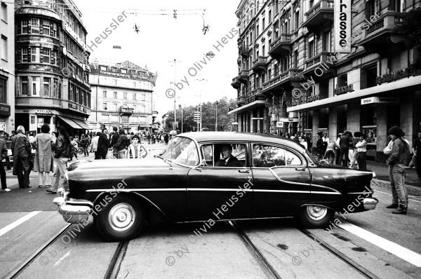 Image of sheet 19800343 photo 13: Postkarte
Jugendbewegung Bewegig AJZ Zürcher Jugendunruhen Demonstrationen 
Zürich Youth movement protest car Schweiz swiss Switzerland
Aus: Zürich, Sommer 1980 p.3
Out of: From time to time  / VonZeitzuZeit
sold to Exil
Exhibition Belgrade Photo Month 2019, 76 x 114 cm
War bei Juan Widmer und wurde dort beschädigt.