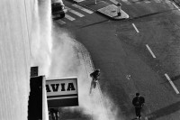 Image of sheet 19800670 photo 22: Mann flüchtet vor einer Traenengas Wolke Zürich 1980. Jugendbewegung Bewegig AJZ Zürcher Jugendunruhen Demonstrationen Manifestators are trying to get away from the huge clouds of teargas that filled the area round the Autonomous Youth Center.