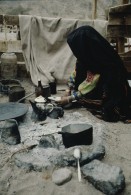 Image of sheet 19803002 photo 116: Beduin Woman preparing food in the Sinai Desert, Israel 1980.