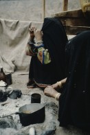 Image of sheet 19803002 photo 117: Beduin Women preparing food in the Sinai Desert, Israel 1980.