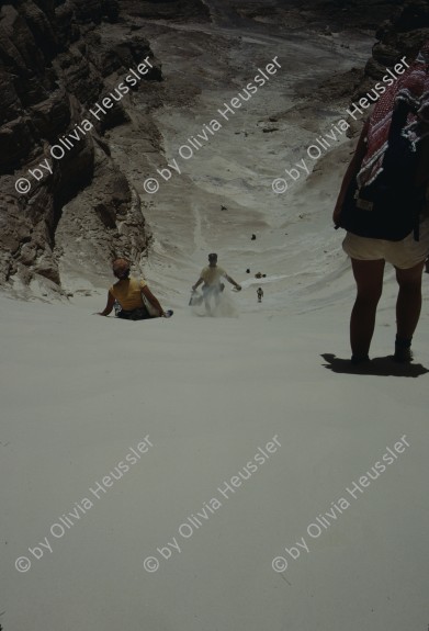 Image of sheet 19803002 photo 76: Tourists bodysurfing in the Sinai Desert, Israel 1980.