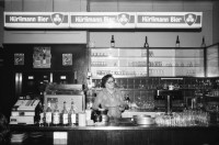 Image of sheet 19810100 photo 11: Restaurant Krokodil an der Langstrasse mit Wirtin am Ausschank, Zuerich 1981.