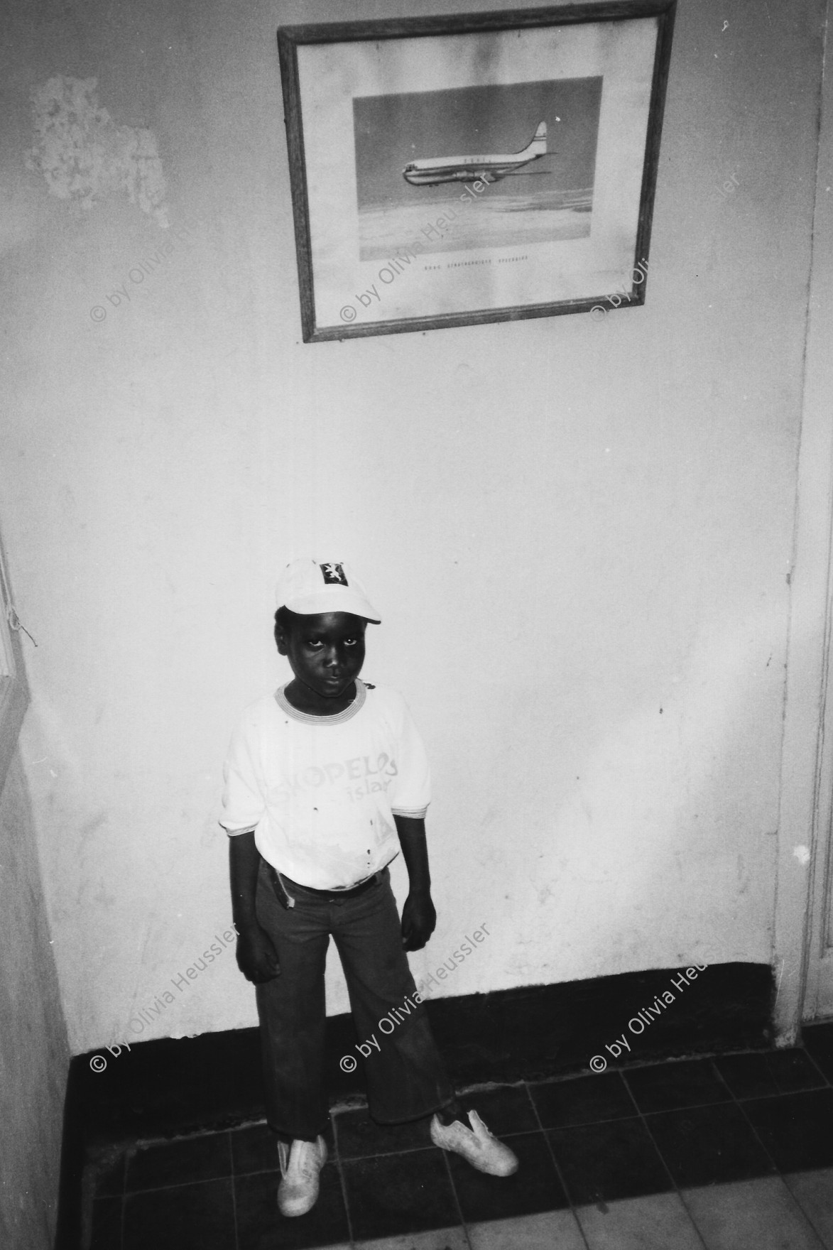 Image of sheet 19820160 photo 34: Der Junge heisst ' Kissinger ' (Nickname) im Hotel El Nilein in Khartoum Sudan 1982 √ Boy named Kissinger.

© 1982, by 0LIVIA HEUSSLER / www.clic.li