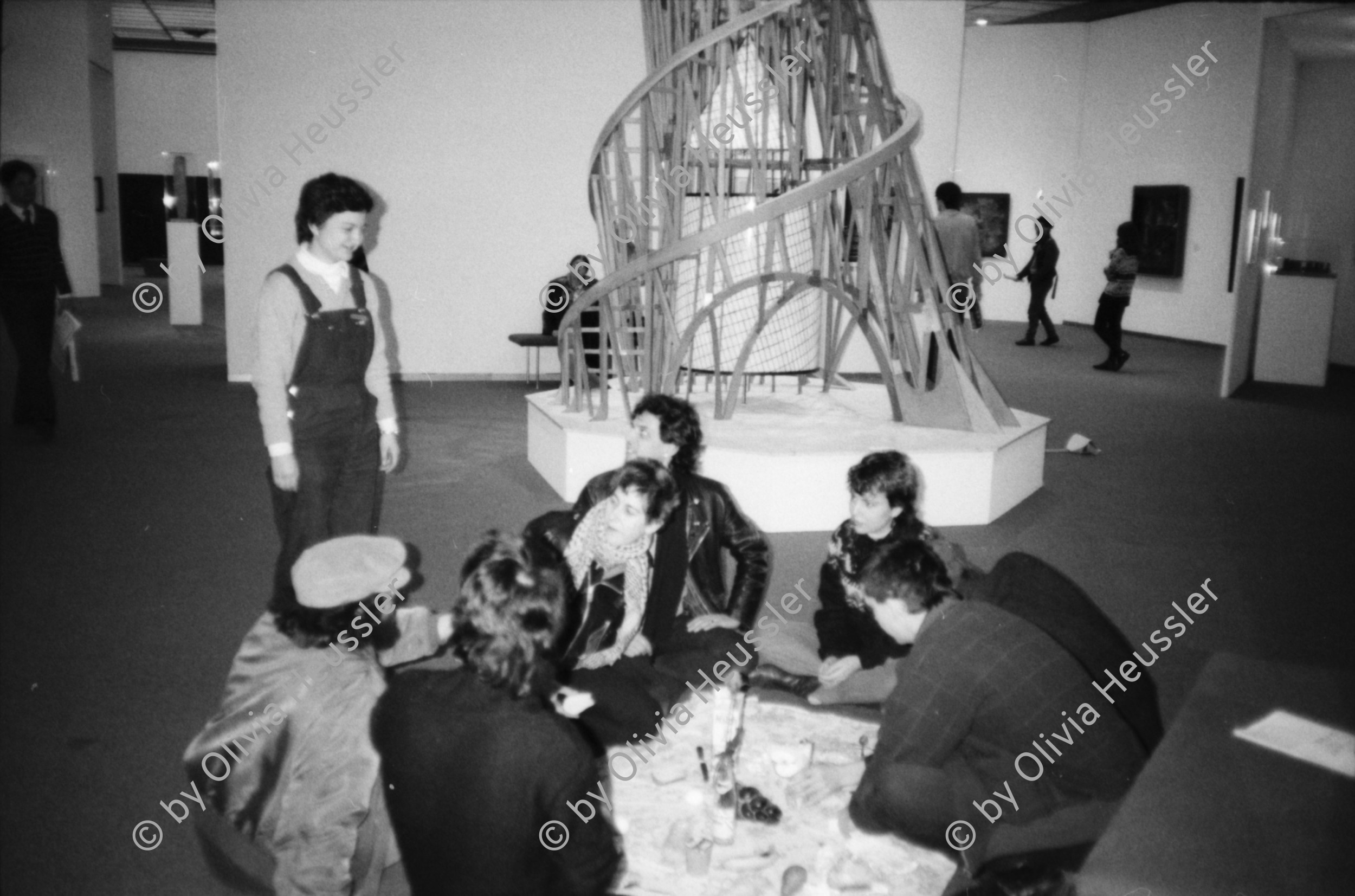 Image of sheet 19830030 photo 24: Reaktion zum Freispruch Zürcher Polizei im Mord von Dani und Michi. Morgenessen Pique Nique im grossen Austellungssaal vom Kunsthaus Gesammtkunstwerk von Harry Harald Szeemann. Securitas weist uns nett weg. WOZ Christoph Schuler.

Kurt Hermann Eduard Karl Julius Schwitters (20 June 1887 – 8 January 1948) was a German painter who was born in Hanover, Germany.

Schwitters worked in several genres and media, including Dada, Constructivism, Surrealism, poetry, sound, painting, sculpture, graphic design, typography and what came to be known as installation art. He is most famous for his collages, called Merz Pictures.