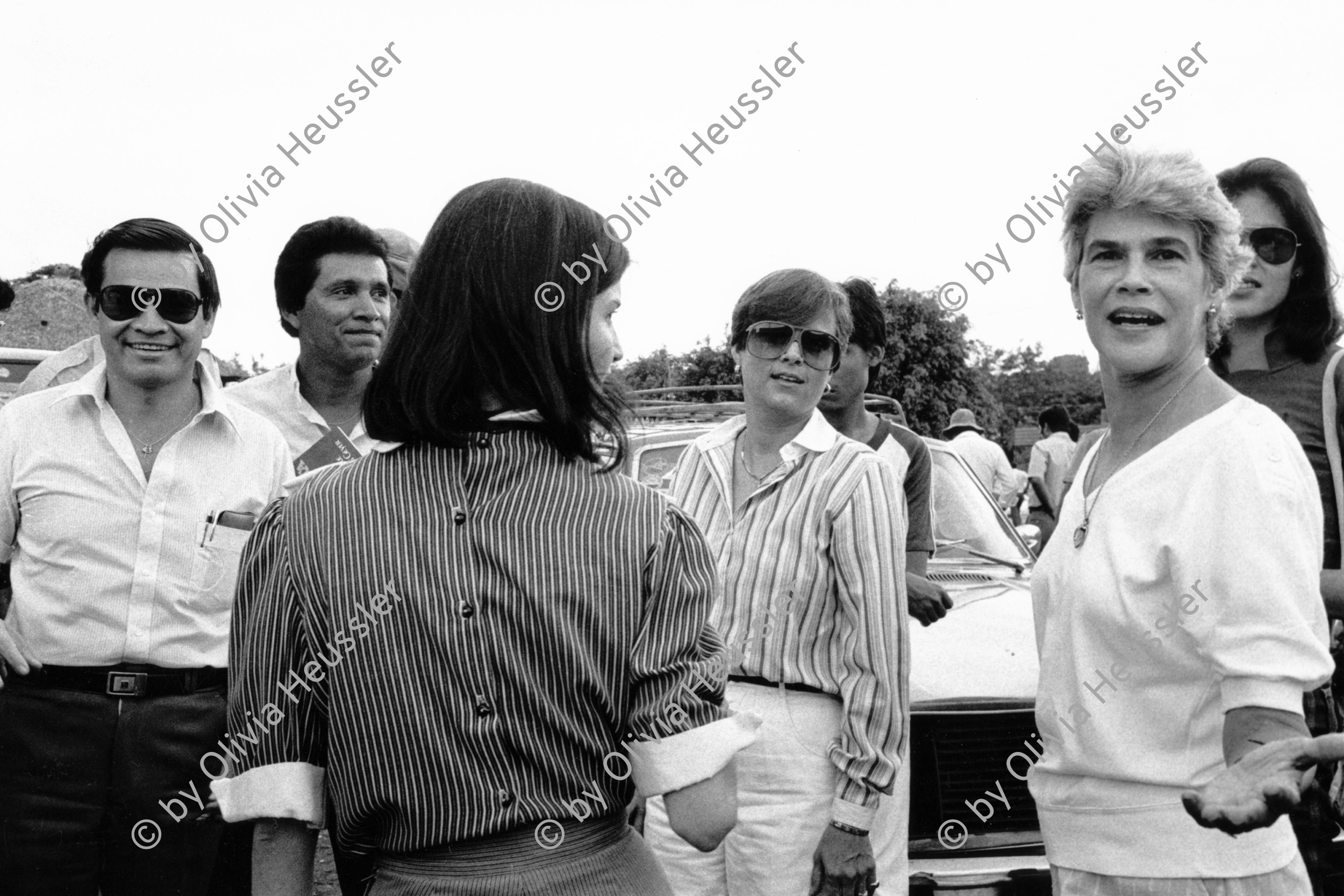 Image of sheet 19840460 photo 24: Die heutige Staatspräsidentin Violetta Chamorro (re.), während einer Veranstaltung der Opposition in der Sandinistischen Regierungsperiode. Managua Nicaragua. 07.84 1984 
Chamorro during a political rally (right)
central america anti sandinist rally  √

Violeta Barrios Torres de Chamorro (born October 18, 1929) is a Nicaraguan political leader, former president and publisher. She became president of Nicaragua on April 25, 1990, when she unseated Daniel Ortega. She was elected as the head of a 14-party anti-Sandinista alliance known as the National Opposition Union (Unión Nacional Oppositora, UNO), an alliance that ranged from conservatives and liberals to communists. She left office on January 10, 1997. Chamorro was the first and only woman to hold that position in Nicaragua. Chamorro was the first elected female head of state in the Americas, the second in the Western Hemisphere after Iceland's Vigdís Finnbogadóttir and the fifth in the world after the elections of Agatha Barbara in Malta, Elisabeth Kopp in Switzerland and Corazon Aquino in the Philippines. She was also the first woman elected in her own right as a head of government in the Western Hemisphere, and the first and only woman in the world to defeat an incumbent president.