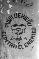 Image of sheet 19840680 photo 24: «Die schönsten Frauen in Nicaragua sind in Matagalpa und geben richtige Liebe» «Las Mujeres mas lindas de Nicaragua estan en Matagalpa y dan amor verdadero» steht auf einem Auto in Matagalpa geschrieben. Sandinistischer Militär Kommandant Alvaro Baltodano steht vor französischem Helikopter Aluette. Wir fliegen nach Waslala. In diesen  Folterkammern Kerkern wurden die Sandinisten hintuntergelassen und Tagelang eingesperrt gefoltert ohne Wasser und Nahrung. Folter. Waslala Uebersicht. Soldat liest. Portrait Frau schaut in Kamera. Lastwagen fährt durch Fluss. Soldaten. Portrait. Helikopter. Mi-8 Sovjetische Bauart. Maschinengewehr im Helikopter. Nicaragua 1984 

Aus: Der Traum von Solentiname/The dream of Solentiname/El sueño de Solentiname