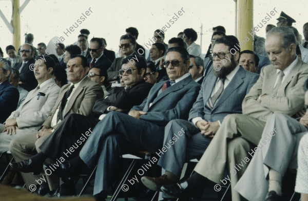 Image of sheet 19843003 photo 8: Ranghohe Offiziere der honduranischen Streitkraefte an einer Parade in Tegucigalpa, Las Tapias, Honduras am 16. April 1984, Zentralamerika.

19843003 1984
Militaer; Personal; Generaele; Honduras; Parade; Verantwortliche; Folter; Las Tapias; Orden; Sonnenbrille; Streitkraefte; Offiziere; ranghohe