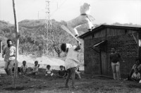 Image of sheet 19850100 photo 8: Kinder tanzen für die Pinata auf der Kaffeehacienda. Von der Ford Stiftung foundation, 
The Ford Foundation is a private foundation based in New York City and created in 1936 by Edsel Ford and Henry Ford. It was funded originally by a US$25,000 gift from Edsel Ford[1] but by 1947 after the death of the two founders, the foundation owned 90 percent of the non-voting shares of the Ford Motor Company. (The Ford family kept the voting shares to themselves.)[2] The foundation sold its Ford holdings and now plays no role in the automobile company. For years, the foundation was the largest and one of the two or three most influential foundations in the world, with a global reach and special interests in education, the arts, and Third World development

ist einer gekommen und singt mit dem Leiter von INIES. Campesina und Pflückerin stellt ihren Pflückkorb selbst her. Handwerk. Die PflückerInnen der Brigade warten auf den Abmarsch ins Feld. Zwei Geschwister und ihre noch leeren Körben. Auf dem Weg ins Feld. kleiner Junge läuft mit den BrigadistInnen. Der Verantwortliche Kaffeevorarbeiter kontrolliert die Arbeit. Gruppenbild mit Olivia. Kleiner Junge beim Plücken. Matagalpa Nicaragua 1985