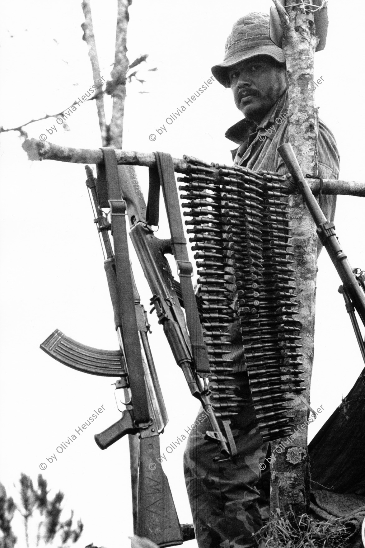 Image of sheet 19850170 photo 25: Sandinistischer Soldat mit sovietischen Kalaschnikov AK-47 und Munition, Las Segovias, Nicaragua 1985. 


Kalashnikova (Russian: Автомат Калашникова). It is also known as a Kalashnikov, an "AK", or in Russian slang, Kalash.