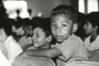 Image of sheet 19850250 photo 4: Dieser Junge im Waisenhaus ' La Mascotta' wartet geduldig auf seinen Auftritt. Es wird Muttertag gefeiert. Managua Nicaragua 1985 √
