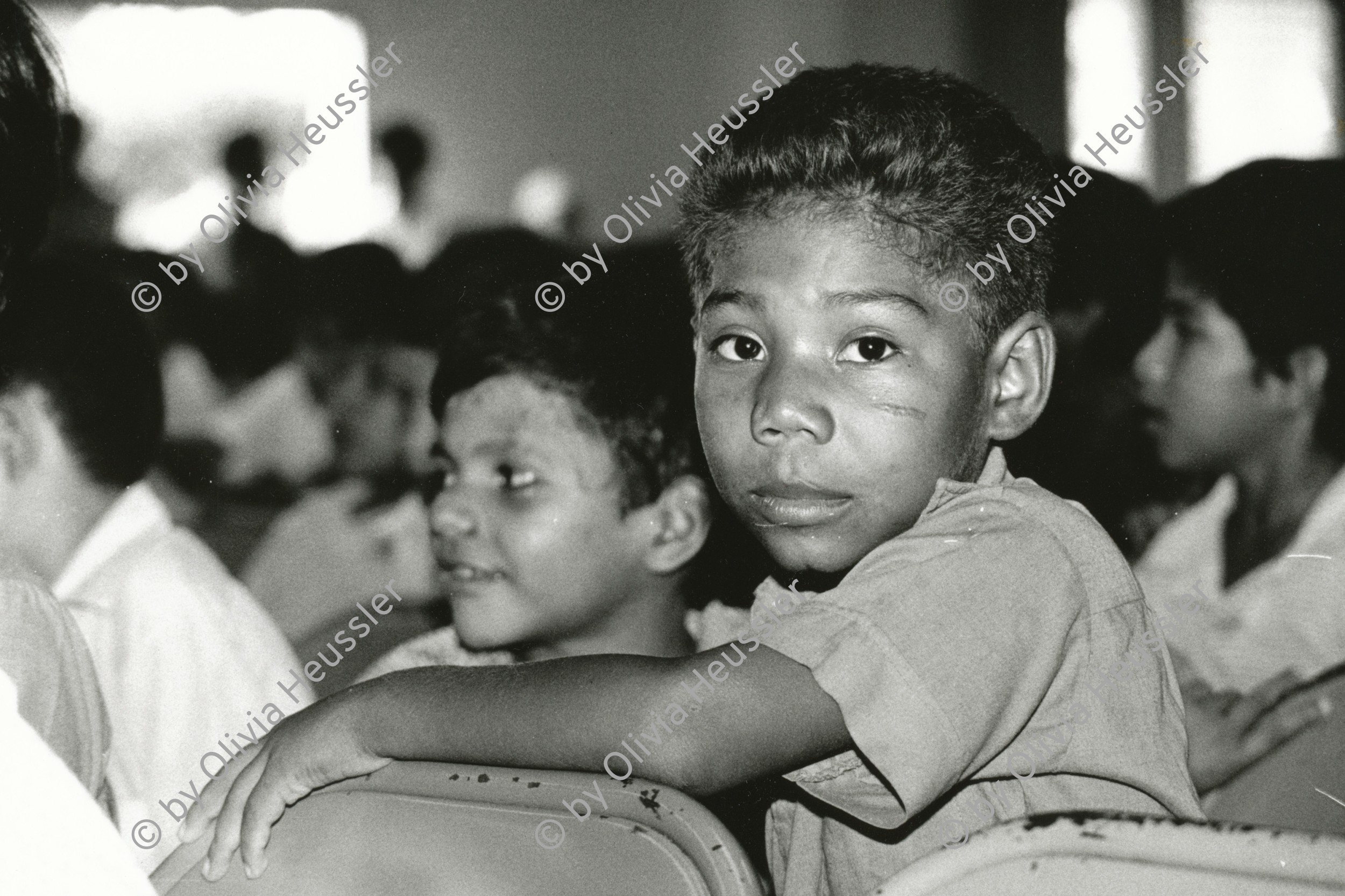 Image of sheet 19850250 photo 4: Dieser Junge im Waisenhaus ' La Mascotta' wartet geduldig auf seinen Auftritt. Es wird Muttertag gefeiert. Managua Nicaragua 1985 √