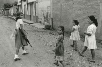 Image of sheet 19850270 photo 26: Flüchtlingsmädchen Mädchen auf dem Heimweg mit Waffe AK-47 im Norden Nicaraguas. Rio Coco Quilali 06.85
Nicaragua 1985 √

The AK-47 is a selective-fire, gas-operated 7.62×39mm assault rifle, first developed in the USSR by Mikhail Kalashnikov. It is officially known as Avtomat Kalashnikova (Russian: Автомат Калашникова). It is also known as a Kalashnikov, an "AK", or in Russian slang, Kalash.