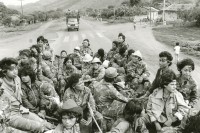 Image of sheet 19850320 photo 36: Das sandinistische Frauenbataillon 'Veronica Lacayo' fährt nach Hause zurück. Irgendwo in Nicaragua. 1985 √


Military Army War Soldier Women Weapon Sandinist EPS FSLN
Members of the Sandinist peoples army female battalion 'Veronica Lacayo' 
The Sandinista Popular Army (or People's Army; Ejército Popular Sandinista, EPS) was the military established in 1979 by the new Sandinista government to replace the National Guard, following the overthow of Anastasio Somoza Debayle.