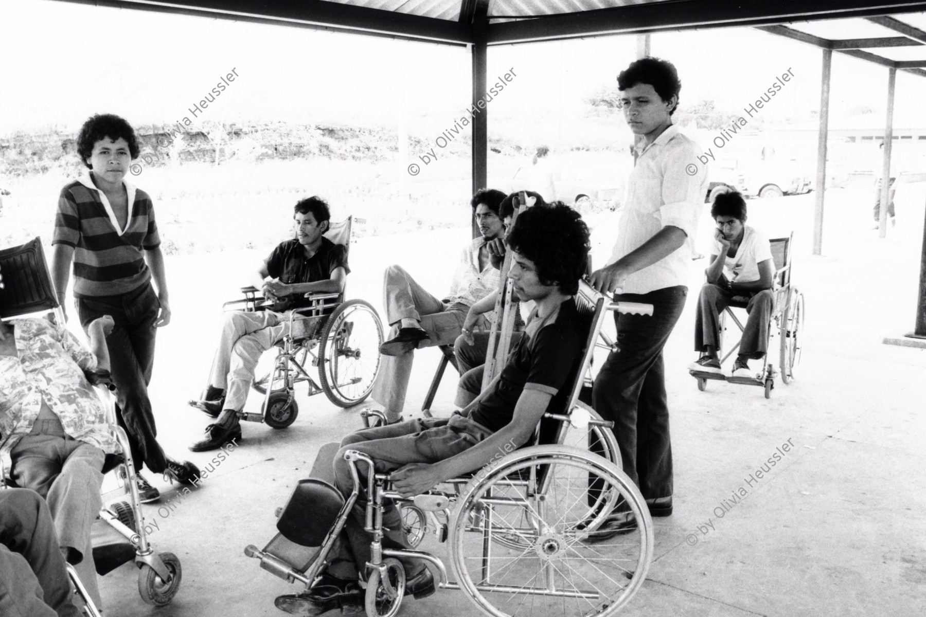 Image of sheet 19850461 photo 14: Im Rehabilitationszentrum für handicapierte Kriegsinvalide Soldaten EPS SMP FSLN im Rollstuhl Wheelchair in Managua Nicaragua 1985 √ Kriegsversehrte disabled
War invalid handicap soldier army hospital health amputierte