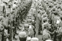 Image of sheet 19850550 photo 14: Truppenübernahme durch Sandinisten Sandinistischen empfangen die Soldaten  des EPS, die aus den Bergen zurückkommen und verabschieden gleichzeitig die neuen, die in die Berge fahren, an die Front. Die Gewehre werden reihenweise zum selben Zeitpunkt übergeben.  Managua Plaza de la Revolucion 1985 Nicaragua √
The Sandinista Popular Army (or People's Army; Ejército Popular Sandinista, EPS) was the military established in 1979 by the new Sandinista government to replace the National Guard, following the overthow of Anastasio Somoza Debayle.
Military Army Soldier Militär Armee Soldat Battalion Weapon AK-47 Soldier Army Sandinist Sandinista EPS SMP Troops Tropa Truppen