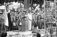 Image of sheet 19850550 photo 8: Ortega und Comp. Militär Truppenübernahme durch Sandinisten Sandinistischen Kommandant Daniel Ortega und Sergio Ramirez empfangen die Soldaten Army Militär Military Army des EPS, die aus den Bergen zurückkommen und verabschieden gleichzeitig die neuen, die in die Berge fahren, an die Front. Die Gewehre werden reihenweise zum selben Zeitpunkt übergeben. Por la Paz Por la Patria por el Futuro. Managua Plaza de la Revolucion 1985
The Sandinista Popular Army (or People's Army; Ejército Popular Sandinista, EPS) was the military established in 1979 by the new Sandinista government to replace the National Guard, following the overthow of Anastasio Somoza Debayle.