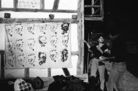 Image of sheet 19870270 photo 12: Besetzung des Freilicht Museums Ballenberg. am Eidg. Bettag. durch Protest Demonstration gegen die Wohnungsnot in Zürich. BesucherInnen in Trachten bestaunen die Transparente. 

Ballenberg is an open air museum in Switzerland that displays traditional buildings and architecture from all over the country. Located near Brienz in the municipality of Hofstetten bei Brienz, Canton of Berne, Ballenberg has over 100 original buildings that have been transported from their original sites