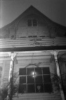 Image of sheet 19870350 photo 12: Hausbesetzung Besetzung Restaurant Annaburg Üetliberg Uetliberg. Gedeckte Tische. M. S beim Kochen. Annaburg mit Beleuchtung im Nebel. und Transparent; 
Annaburg wieder bewohnt Uetliberg 
Stop Pigs
Barrikade mit Stühlen. und Tischen. tomi hämmerli haemmerli und Feuer auf dem Weg gegen die Polizei. Frühstück Zürich 1987 housing occupation occupied house home protest swiss switzerland Schweiz Europe
