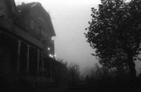 Image of sheet 19870350 photo 13: Hausbesetzung Besetzung Restaurant Annaburg Üetliberg Uetliberg. Gedeckte Tische. M. S beim Kochen. Annaburg mit Beleuchtung im Nebel. und Transparent; 
Annaburg wieder bewohnt Uetliberg 
Stop Pigs
Barrikade mit Stühlen. und Tischen. tomi hämmerli haemmerli und Feuer auf dem Weg gegen die Polizei. Frühstück Zürich 1987 housing occupation occupied house home protest swiss switzerland Schweiz Europe