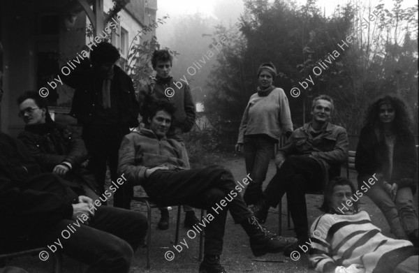 Image of sheet 19870350 photo 26: Hausbesetzung Besetzung Restaurant Annaburg Üetliberg Uetliberg. Gedeckte Tische. M. S beim Kochen. Annaburg mit Beleuchtung im Nebel. und Transparent; 
Annaburg wieder bewohnt Uetliberg 
Stop Pigs
Barrikade mit Stühlen. und Tischen. tomi hämmerli haemmerli und Feuer auf dem Weg gegen die Polizei. Frühstück Zürich 1987 housing occupation occupied house home protest swiss switzerland Schweiz Europe