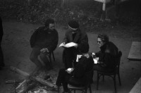Image of sheet 19870350 photo 33: Hausbesetzung Besetzung Restaurant Annaburg Üetliberg Uetliberg. Gedeckte Tische. M. S beim Kochen. Annaburg mit Beleuchtung im Nebel. und Transparent; 
Annaburg wieder bewohnt Uetliberg 
Stop Pigs
Barrikade mit Stühlen. und Tischen. tomi hämmerli haemmerli und Feuer auf dem Weg gegen die Polizei. Frühstück Zürich 1987 housing occupation occupied house home protest swiss switzerland Schweiz Europe