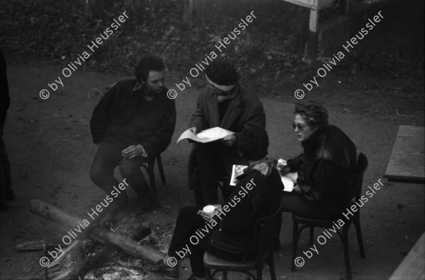 Image of sheet 19870350 photo 33: Hausbesetzung Besetzung Restaurant Annaburg Üetliberg Uetliberg. Gedeckte Tische. M. S beim Kochen. Annaburg mit Beleuchtung im Nebel. und Transparent; 
Annaburg wieder bewohnt Uetliberg 
Stop Pigs
Barrikade mit Stühlen. und Tischen. tomi hämmerli haemmerli und Feuer auf dem Weg gegen die Polizei. Frühstück Zürich 1987 housing occupation occupied house home protest swiss switzerland Schweiz Europe