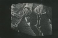 Image of sheet 19880060 photo 33: Photographien ab Television Monitor TV mit  Intifada in Palästina. Steinschleuder. 
1988 Zürich √ slingshot 
© 1988, OLIVIA HEUSSLER / WWW.CLIC.LI