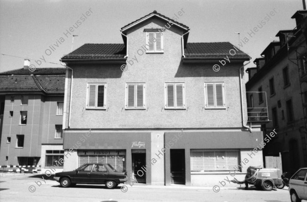 Image of sheet 19880390 photo 7: Ein besetztes Haus in Romanshorn. Das Fenster ist mit einem
Bestzer Innen Zeichen bemalt. Selbstportrait Olivia im Erismannhof. 1988 Zürich