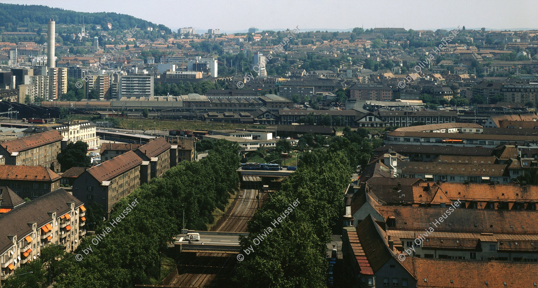 Image of sheet 19880620 photo 4: Sicht auf städtische Wohnsiedlung Erismannhof 1988 vom Lochergut √ Aussersihl Kreis vier 4 Schweiz Switzerland swiss Schweizer Europe Architektur sinar 4 x 5 inch Seebahnstrasse Zuglinie Train tracks zug SBB trassee Josefstrasse Kehrichtverbrennung Kamin Waidberg Zürich Kreis fünf 5

copyright by Olivia Heussler