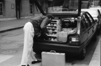 Image of sheet 19880810 photo 4: Ein fahrender ambulanter Verkäufer. Mann spritzt Gehsteig und behindert anderer. Kunst in Bern.Museum. Amtshaus besprayt mit: Theater Zutritt frei! Mutter und Kind im Snugli.
Schaufenster. Italienisches Evangelisches Zentrum. Schaufenster. Im Musseé de l'Elyseé quasselt unser Professor Urs Stahel (heutige Leiter des Fotomuseums in Winterthur) über Photographie. Nadia Anastasiu Peter Luem etc. Schüler von der 4 . Fotofachklasse. Portrait Urs Stahel.Portrait bei Jörg Huber. Der Nicaraguanische Bildhauer Aparicio Artola in Zürich. Portrait. 1988
