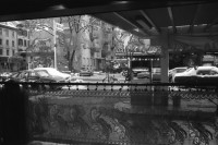 Image of sheet 19880870 photo 19: Schnee im Kreis 5 fünf Im Café am Helvetiaplatz. Eingepacktes Haus in Renovation. Mann Liest im Tram Strassenbahn. Portrait Antonio Turok der mexikanischer Photographer Photography Fotograf. Ich schenkte ihm ein T-Shirt
 'Political Asylum'. In meiner Küche im Erismannhof. Ich schneide ihm seinen Zopf. Im Stray Cats trinken wir Champagner .alles Leica M4 Test Zürich Aussersihl Kreis vier Switzerland housing
