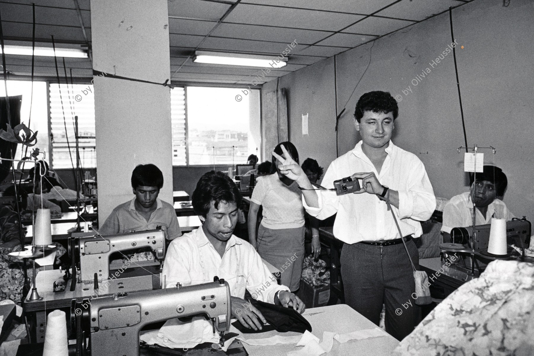 Image of sheet 19880980 photo 22: Eine Miniempresa Fundes-Projekt Schneiderei Chef im Arbeitsraum.  Indigena Indio an der Arbeit in der Schneiderei. Guatemala City 
Arbeitskraft in einem Kleinbetrieb von Guatemala. Produktion von Jeans und Uniformhosen im Betrieb Merar y Torres.
 in a small Guatemaltecan Industrial Firm that is being subsidized by the Swiss Organization 'Fundes'. Fundes contributes money to small industries in Third World Countries and gets its money from the Swiss Industry. Guatemala 1988 √ City