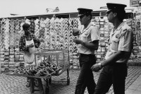 Image of sheet 19890580 photo 10: Verkaufsstand mit Süssigkeiten und typischen Broten. Vor Postkarten stand. Polizeipatruille Patrullie Polizei Police Türkei,  in Istanbul Turkey 7.89 1989 √