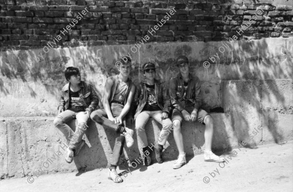 Image of sheet 19890630 photo 0: Jugendliche 'Punks' in einem Innenhof. Gruppenbild Die Iran ische Botschaft in Sofia. Es hängen viele Propaganda-Bilder im Schaukasten. Schlangenstehen. Alte in einer Volksküche. Innenstadt. Maja Wicki Portrait Anschlag für Todesanzeige an Gartentor. Portrait Maja Markova. (TA Magazin). Im Zug nach Razgrad und Shumen treffen wir einige Vietnamesische Fremdarbeiter. Im alten Bahnwagen bläst der Wind in  die Gardinen. Die Strasse von Shumen nach Razgrad. Bulgarien Bulgaria 1989
Shumen (Bulgarian: Шумен, also spelled Shoumen or Šumen) is the tenth-largest city in Bulgaria and capital of Shumen Province.