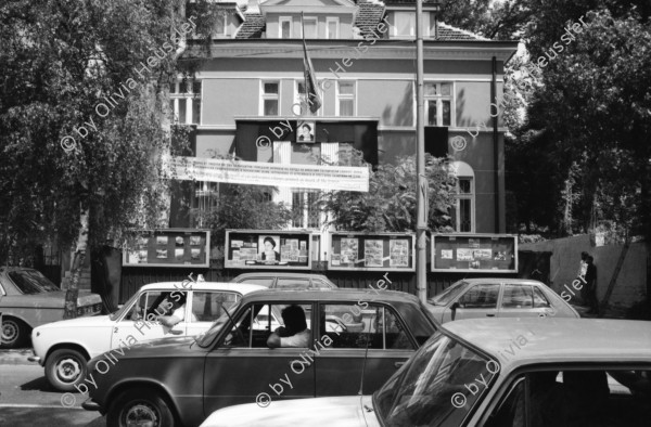 Image of sheet 19890630 photo 4: Jugendliche 'Punks' in einem Innenhof. Gruppenbild Die Iran ische Botschaft in Sofia. Es hängen viele Propaganda-Bilder im Schaukasten. Schlangenstehen. Alte in einer Volksküche. Innenstadt. Maja Wicki Portrait Anschlag für Todesanzeige an Gartentor. Portrait Maja Markova. (TA Magazin). Im Zug nach Razgrad und Shumen treffen wir einige Vietnamesische Fremdarbeiter. Im alten Bahnwagen bläst der Wind in  die Gardinen. Die Strasse von Shumen nach Razgrad. Bulgarien Bulgaria 1989
Shumen (Bulgarian: Шумен, also spelled Shoumen or Šumen) is the tenth-largest city in Bulgaria and capital of Shumen Province.