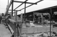 Image of sheet 19890831 photo 12: Freiwillige Angehörige und FreundInnen Drogenabhängiger kochen jeden Tag für die schwachen gehetzten Drogenabhängigen  Fixer und Fixerinnen auf dem Zürcher Platzspitz im Winter. Ausländischer Arbeitnehmer arbeitet am Bahnhof. Long Street Bar Langstrasse, Aussersihl Prostituierte werden verfolgt. Sexshop Sexyland und Videothek im Kreis 4 Zürich 1989

Two women from the Dominican Republic are being followed by a white Swiss in front of the Postoffice on the Helvetiaplatz During the last ten years the immigration of black colored people into Switzerland has increased considerably and has also provoked rassist movements in Switzerland.