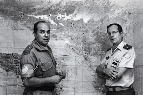 Image of sheet 19900250 photo 15: General Agustin Quesada (R) Spanien und leitet die UNO Truppen im Einsatz zur Entwaffnung der Contrarebellen Contras, die gegen die Sandinisten in Nicaragua kämpften, in Honduras. Danli 1990 04.90 √

Chief of Central American U.N. Observers General Agustin Quesada Gomez (R) Chief of the United Nations Observer forces in Central America, and Lt. Luis Alejandre of Spain (L) in the operations headquaters in Tegucigalpa. Quesada of Spain is in charge of all U.N. troops in the five Central American countries. AP leaserPhoto) Olivia Heussler of Lookat Photos)