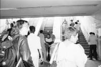 Image of sheet 19900420 photo 13: Bei Theodor Redlov seinem Sohn mit Susan. Theodor mit Bild von Fotos seiner Familie. Auf Handführung der Rolltreppe liegt einer. Mit Emilia Anna Clopath unterwegs. Golani demonstrieren auf Universitätsplatz. Besetzung mit Zelten. Mädchen schreibt Pank auf ihre Jeans. Roma verkauft Flüssiges. Tätowierter Arm.
Soldaten und junge Frau mit Blume vor Panzer. Hotel Bucuresti. Anna Emilia Clopath (gest.) (Schwester von Donata Bäuerin in Donat) und Olivia und Roland Bigler CICR im grossen Badezimmer des ehemaligen rumänischen Aussenministers. Dusche. 
Golani demonstrate on University Square. Occupation with tents political protest
Bukarest Romania Rumänien 1990