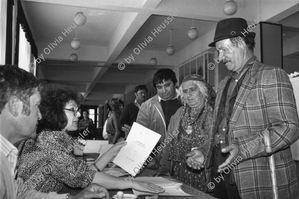 Image of sheet 19900490 photo 15: Romania Rumänien Rumania √
Roma Romi Zigeuner Gypsies for the first elections after 40 years. 
democratical demokratie process prozess Wahlen 

The Roma (Roma in Romani; Romi or Țigani in Romanian) constitute one of the largest minorities in Romania. According to the 2011 census, they number 619,007 people or 3.2% of the total population, being the second-largest ethnic minority in Romania after Hungarians. The Roma are Romania's most socially and economically disadvantaged minority, with high illiteracy levels