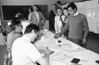 Image of sheet 19900490 photo 3: Wahlen. Rom beim wählen. Der Parteivorsitzende mit seinen Mitarbeitern Mihai im Büro einer der Romni Parteien.Bei der Familie Mihai. Familie Mihai geht ins Wahllokal. Die Grossmutter hat Jahre in Internierungslager im heutigen Moldavien Moldavia ehemalige Sovietunion,  leben müssen, ist auch dabei. Nr. 18. 2 Kinder mit Kinderwagen. Familie Tatu wählen zu Hause. PK in Bukarest. Nr. 23 li: Ivan Gheorghe parlamentarier, Mi: Nikolae Gheorghe. Re: Prof. Raditz.Nr. 31 Luminita Cioaba (mi). US Demokraten und Republikaner National Affairs, überwachten die Wahlen. PK. 

Sibiu. 1990 Romania Rumänien Rumania 
Roma Romi Zigeuner Gypsies for the first elections after 40 years. 
democratical demokratie process prozess