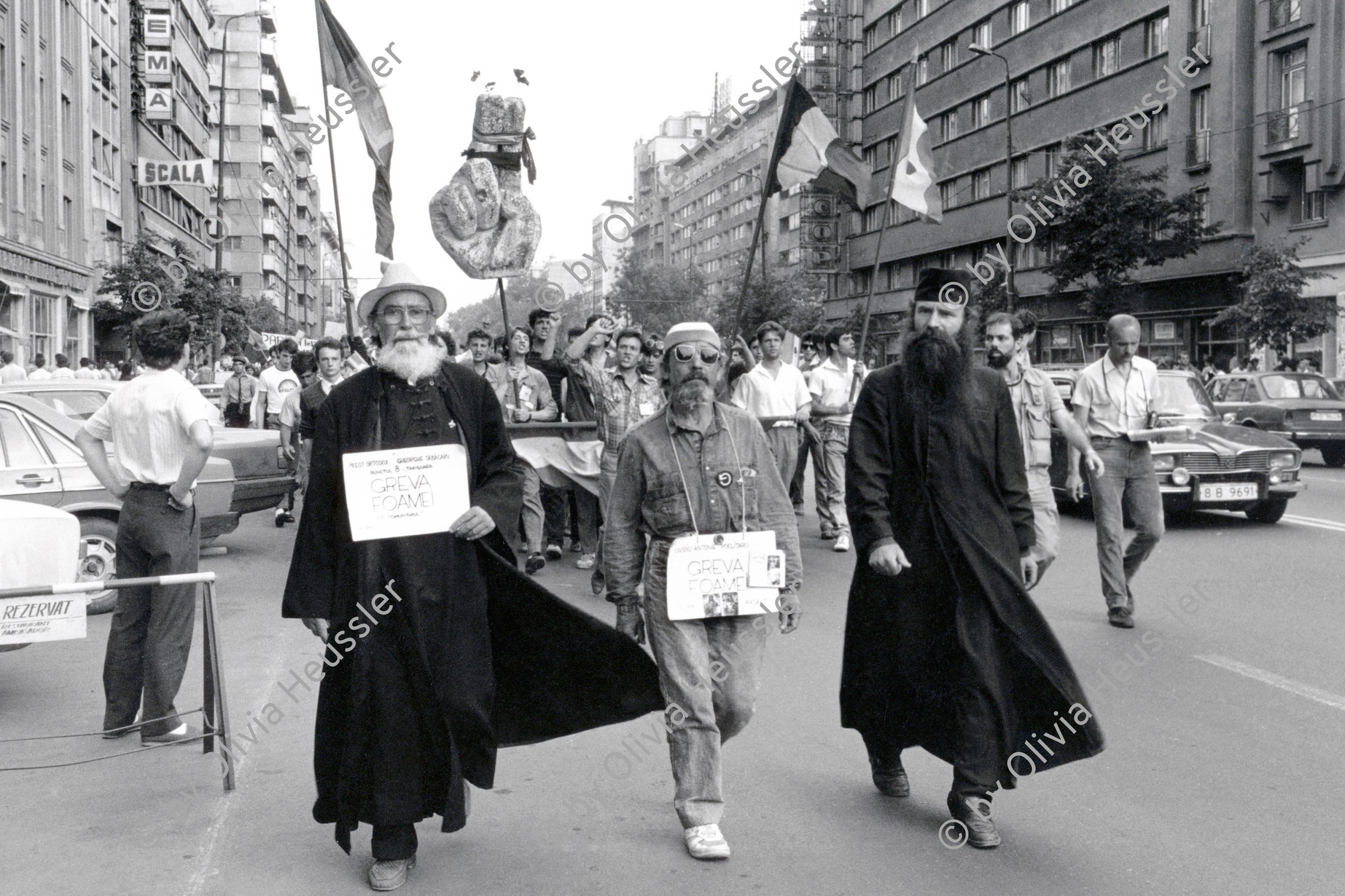 Image of sheet 19900520 photo 11: Die Gruppe der 'Golani's' an einem Protest Marsch der Hungerstreikenden Hungerstreik 'Greva foame' gegen die Regierung Ion Iliescus vom FSN in Richtung staatliches Fernsehgebäude. Bukarest Rumänien Rumania Romania 1990 05.90 √

The National Salvation Front (Romanian: Frontul Salvării Naţionale, FSN) was the governing body of Romania in the first weeks after the Romanian Revolution of 1989, subsequently turned into a political party. FSN is the common root of two of the three largest political parties in Romania today: the Social Democratic Party (PSD) and the Democratic Liberal Party (PD-L).