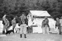 Image of sheet 19900540 photo 36: Das Waffenplatzgegner Camp steht kurz vor der polizeilichen Räumung. Zwischen den Zelten stehen zwei Holz plastiken. Skulpturen aus Holz. Protest.  1990 Neuchlen Anschwilen St. Gallen Schweiz Waffenplatz Gewaltfreie Aktion Militär military army armee  protest √ Europe
Armee gegner
The opponents camp is about to be cleared by the police. Between the tents stand two wooden sculptures. Switzerland protest against military Swiss camp anti militarist art wood