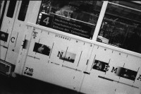 Image of sheet 19900660 photo 11: Ende der Besetzung Camp, des Protest gegen den Waffenplatz in Neuchlen Anschwilen. Die Holzplastik steht alleine da. Filmtram. Alter Mann im Tram Strassenbahn mit aufgehängter Garderobe. public transport street car. Schweiz Swiss Switzerland Zürich 1990
Plastiksack und Regenschirm. Mann steigt in Tram, Oliver Hardy auf Photographie lacht in Camera. Tram Nr. 4. vier 
Frankreich: Alsace France, Elsass, Elbach. Haus von Percy Heussler (Vater 1926) Wechselrahmen Vitrinen für Wohnhilfe Wohnbedarf. Badezimmer und Fassade, noch unfertig. 1990