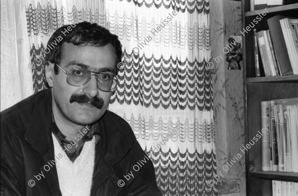 Image of sheet 19900990 photo 1: Journalist und Verwalter im Stadtzentralvorstand SPNr. 2 - 4 Hatip Dicle, Vorstandsmitglied IHD (Türkischer Menschenrechtsverein) in Diyarbakir Journalist an Schreibmaschine. Beerdigung in Lice von Kudret Filiz, 27 ig, Bäuerin. Männer und Frauen stehen getrennt. Männer stehen um das Grab und Hacken abwechslungsweise im harten Gestein. Das Grabloch. Das Fabrikgebäude. Portrait Frauen mit weissem Schal vermummt. Türkei Kurden Kurdistan Kurdish Turkey 
Lice (pronounced [ˈlidʒe]), (Kurdish: Licê) is a Kurdish district of Diyarbakır Province in Turkey. The population is 9,644 as of 2010. It is located 90 km (56 mi) from the capital, Diyarbakır. The mayor is Fikriye Aydın (BDP).