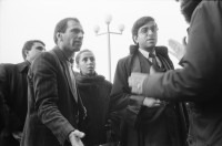 Image of sheet 19901080 photo 12: frtsg. 901010  Beerdigung in Dabulö. Die Tochter der getöteten Bäuerin Kudret Filiz, sitzt am Rande und schreit ununterbrochen bis ihr alle Glieder zu schmerzen beginnen. Als Mädchen dürfte sie nicht unter den Männer an der Beerdigung teilnehmen. Der Bürgermeister Halit Nazmi Balkas. Portrait von einer kurdischen Frau mit ihren Tätowierungen. Portrait vom irakischen Führer der Peschmerga im dem Irak. Salih Hagi Husseiyn Othman Portrait eines alten Kurden. Die Männer sitzen in einer Teestube. Windjacken hängen wie Menschen an einer Strassentafel. Vor dem Staatsgericht in Ankara stehen die Verteidiger von Vedat Aydin, Mustafa Oezer und Achmet Zeki Okcuoglu, Uebersetzer. Aydin wurde im Juli 91 von Todesschwadronen ermordet. Auch der britische Anwalt von Amnesty International (mit Beat Schuler) darf dem Prozess nicht beiwohnen. Alle Verwandten aus Djyarbakir mussten nach 12 stündiger Fahrt wieder zurück. Kontrolle am Eingang. Im Innern begann ein Protest der Verteidiger und nach einer Stunde wurde unsere Delegation eingelassen.  Kurdish Turkey Kurds