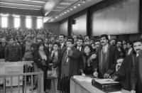 Image of sheet 19901100 photo 24: frtsg. 901090 Im Staatsgericht Ankara. Der Prozess um den kurdischen Anwalt Vedat Aydin Nr. 5, der im Juli 91 von Todesschwadronen umgebracht wurde. Im Prozess wurden alle drei wegen Kurdisch sprechens verklagt, und später frei gesprochen. Mi: Ahmet Zeki Okçuoğlu, und re: Mustafa Oezer (HEP). In der Anklagebank. Umringt von türkischen Militärs. Die Verteidiger Innen, über 100, zogen sich unter Protest zurück und führten später ihre Plädoyer aus dem Zuschauerraum. Turkey Kurdish Kurds
Die angeklagten kurdischen Anwälte v.l.n.r. Vedat Aydin, 

(Vedat Aydın, the Diyarbakır branch chairman of the now-defunct People’s Labor Party (HEP), was found dead on a road near Malatya on 7 July 1991, two days after armed men had taken him from his home in Diyarbakir. The widow Sükran Aydın thinks her husband’s murder was a turning point and that there was a sudden increase in the number of unsolved murders in the country’s Southeast following his death. She believes that a clandestine unit within the gendarmerie was responsible for the murder.[48] Only 18 years after the killing the public prosecutor in Diyarbakir opened a file seeking the detention of nine JITEM members including the Major Aytekin Özen)



Ahmet Zeki Okçuoğlu, und Mustafa Oezer während einem Prozess im Ankaraer Staatsgericht. Ahmet Zeki Okçuoğlu, ist 1999 einer der Verteidiger im Prozess gegen den Kurdenführer Oecalan. Öcalan Ankara Türkei 12.90