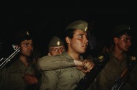 Image of sheet 19903002 photo 46: Angehörige des FSN (Frontul Salvari National) demonstrieren mit Blumen für die Unterstuetzung Ion Illiescus vor Polizisten  in Brasov am 17. Mai 1990. Rumaenien, Europa. // Flowers in front of the policemen, from the fanatical part of the electoral rally of Iliescu.  

19903002 12
Protest; Blumen; Frauen; Polizei; Beamte; Maenner; Uniform; Brasov; Wahlen; Iliescu; Demonstration
Rom Partei Wahlen Romanes
Zigeuner